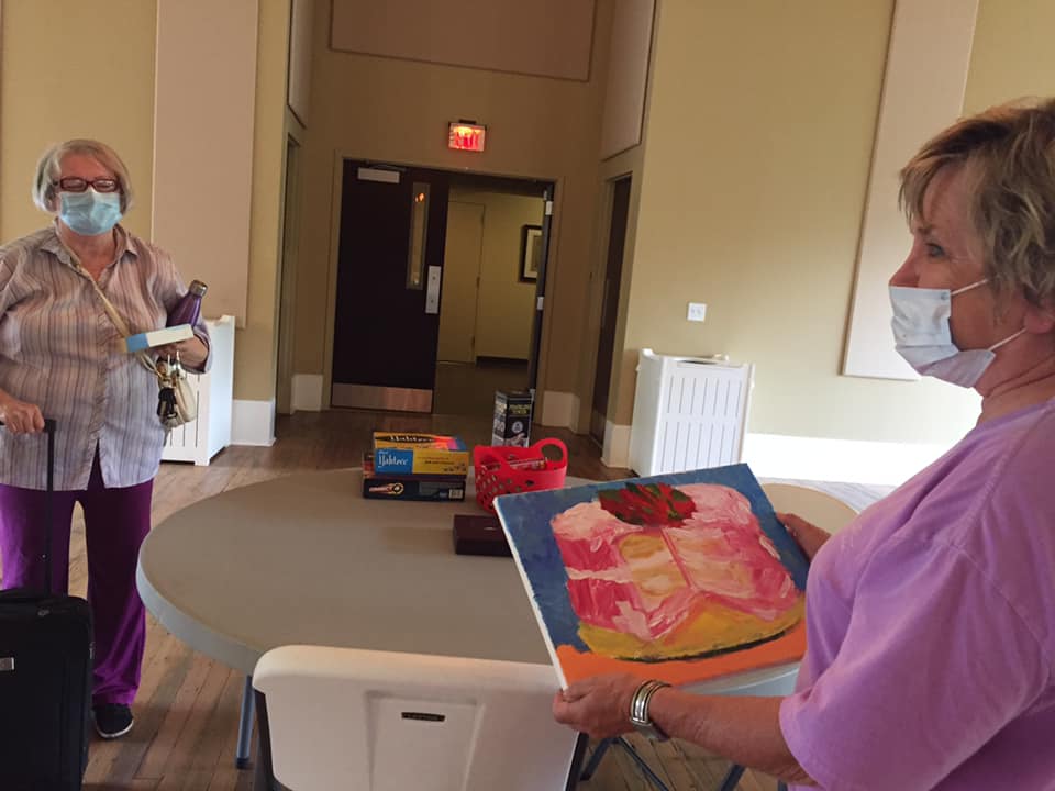 Resident at work on a small canvas